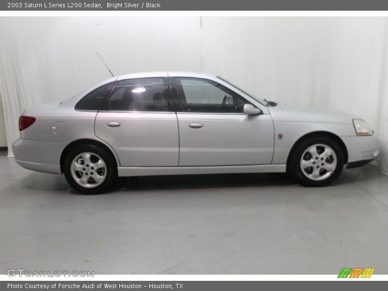 Bright Silver / Black 2003 Saturn L Series L200 Sedan