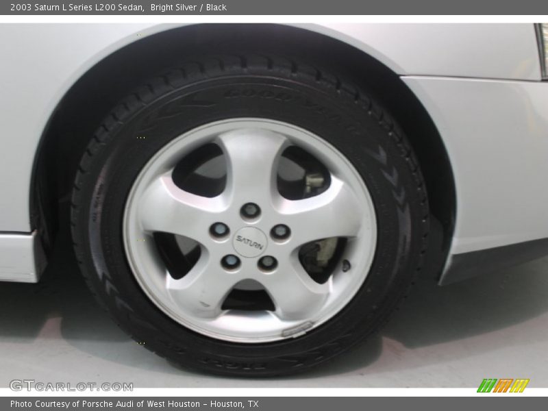 Bright Silver / Black 2003 Saturn L Series L200 Sedan