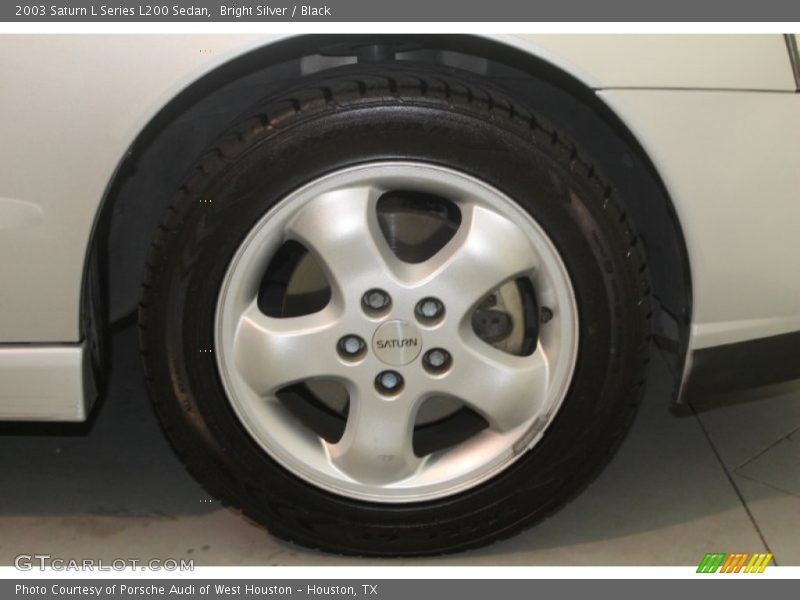 Bright Silver / Black 2003 Saturn L Series L200 Sedan