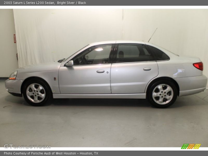 Bright Silver / Black 2003 Saturn L Series L200 Sedan