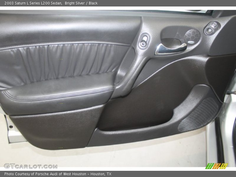 Bright Silver / Black 2003 Saturn L Series L200 Sedan