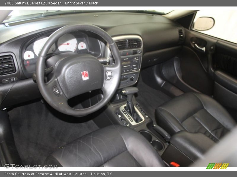 Bright Silver / Black 2003 Saturn L Series L200 Sedan