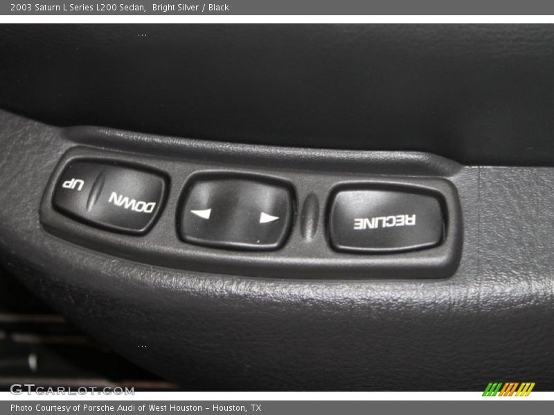 Bright Silver / Black 2003 Saturn L Series L200 Sedan