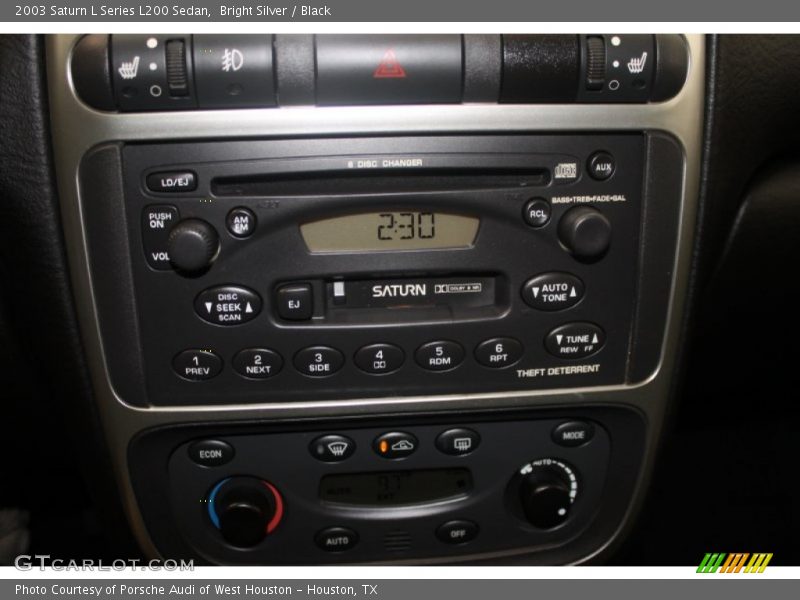 Bright Silver / Black 2003 Saturn L Series L200 Sedan