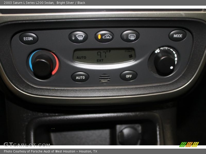 Bright Silver / Black 2003 Saturn L Series L200 Sedan