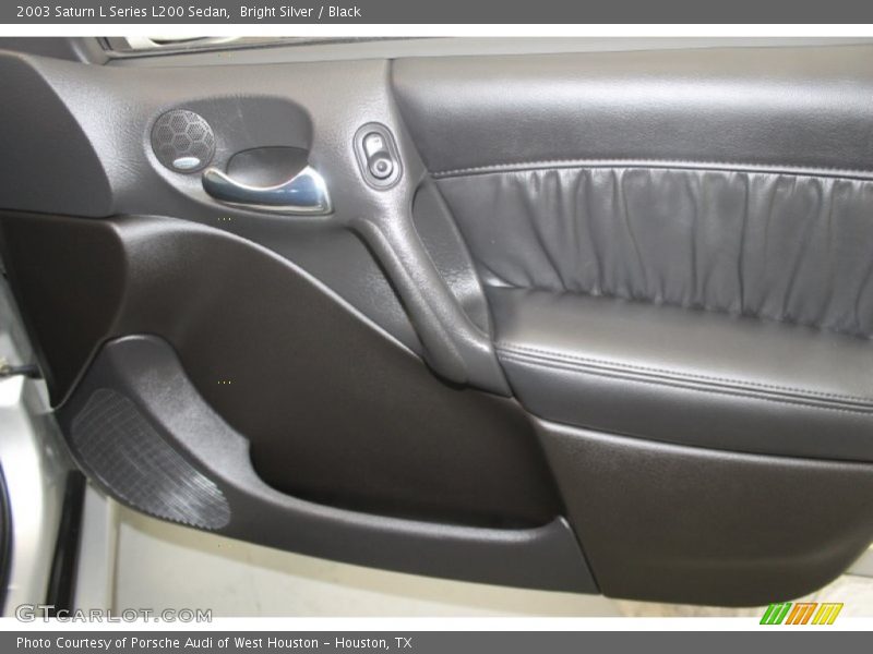 Bright Silver / Black 2003 Saturn L Series L200 Sedan