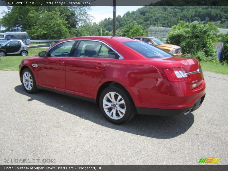 Red Candy / Charcoal Black 2011 Ford Taurus SEL