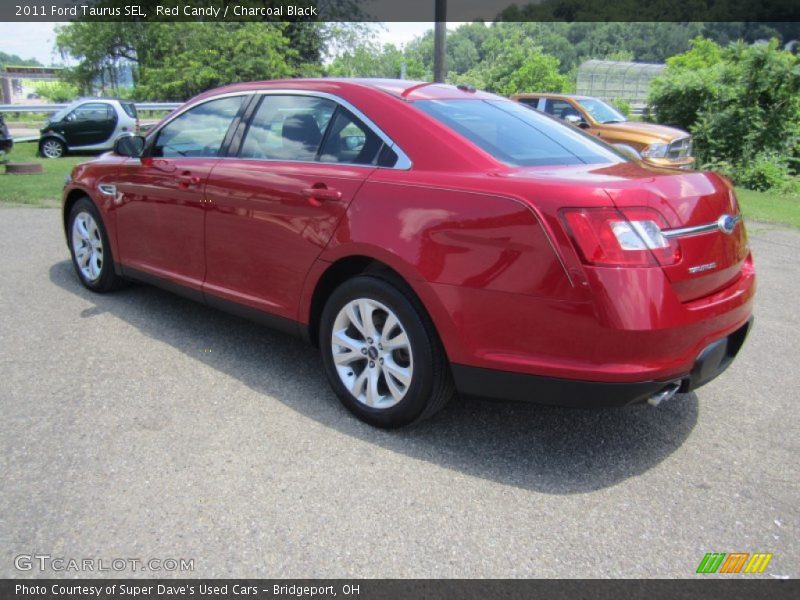 Red Candy / Charcoal Black 2011 Ford Taurus SEL