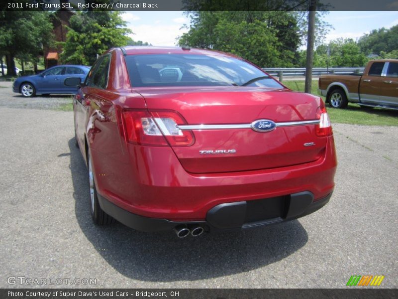 Red Candy / Charcoal Black 2011 Ford Taurus SEL