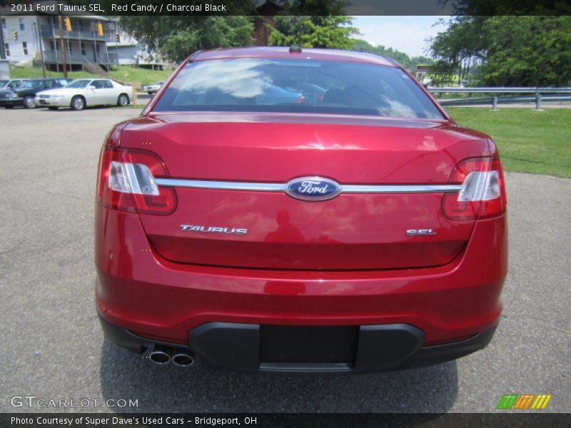 Red Candy / Charcoal Black 2011 Ford Taurus SEL