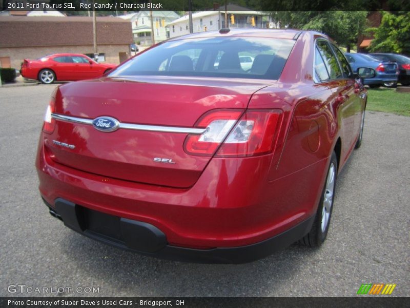 Red Candy / Charcoal Black 2011 Ford Taurus SEL