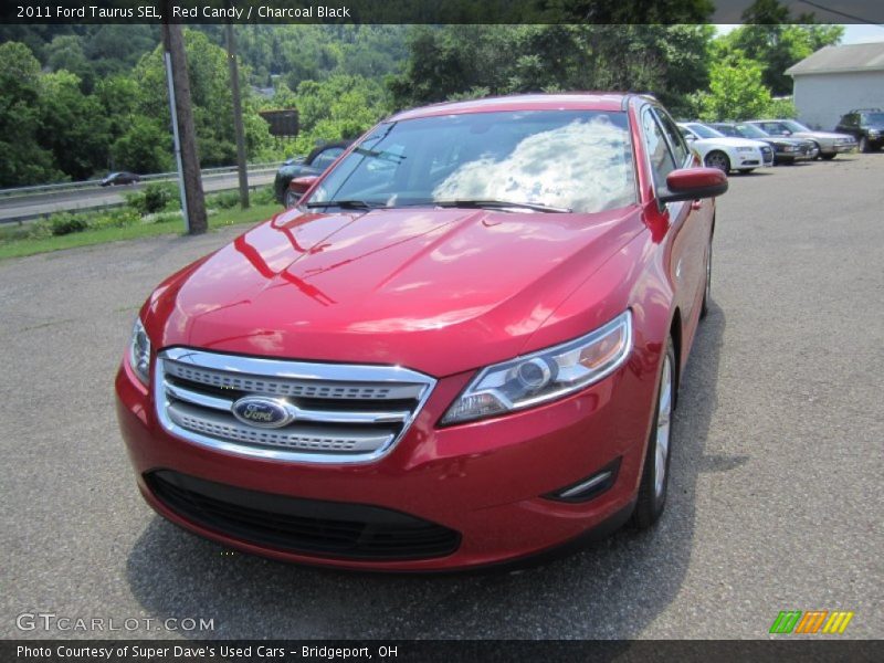 Red Candy / Charcoal Black 2011 Ford Taurus SEL