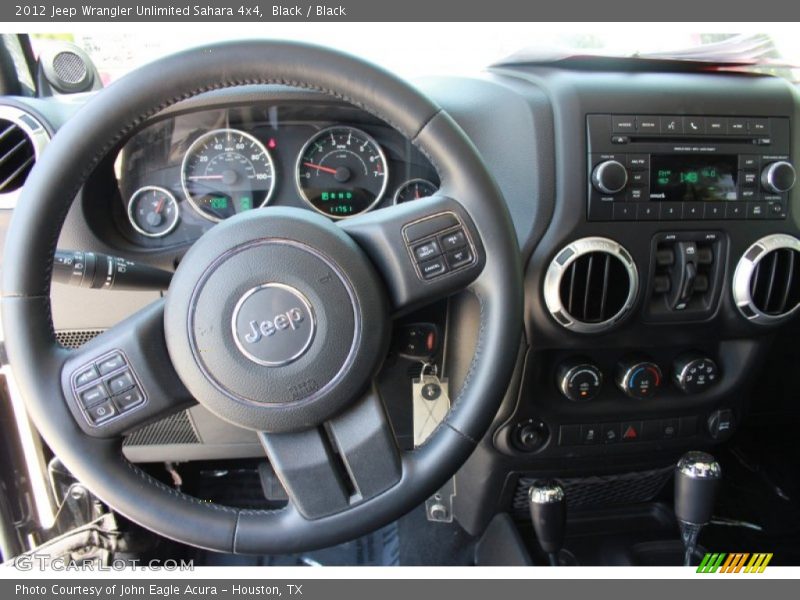Black / Black 2012 Jeep Wrangler Unlimited Sahara 4x4