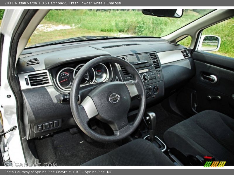 Dashboard of 2011 Versa 1.8 S Hatchback