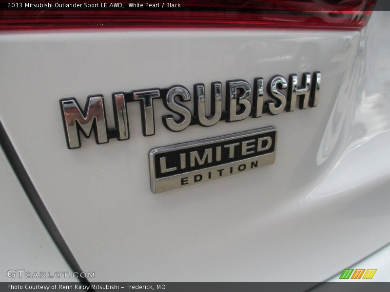  2013 Outlander Sport LE AWD Logo