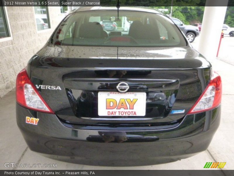 Super Black / Charcoal 2012 Nissan Versa 1.6 S Sedan