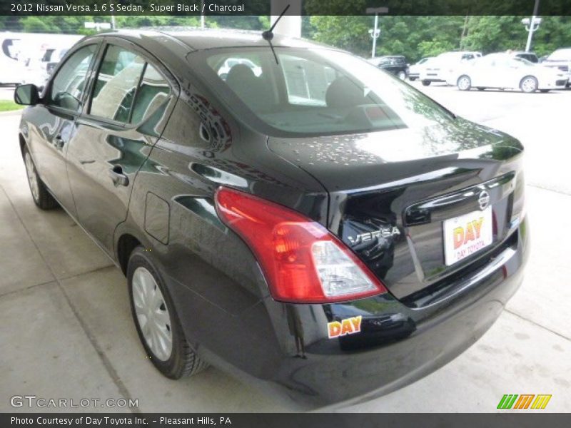 Super Black / Charcoal 2012 Nissan Versa 1.6 S Sedan