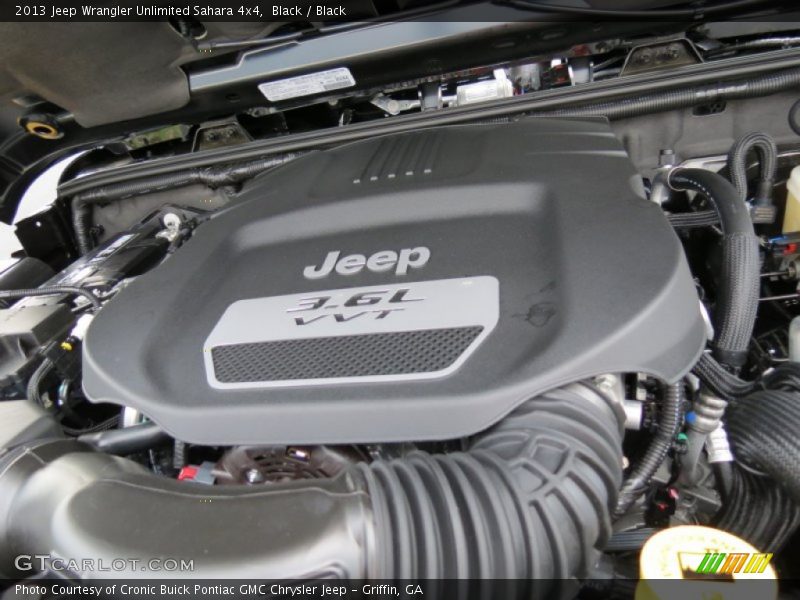 Black / Black 2013 Jeep Wrangler Unlimited Sahara 4x4