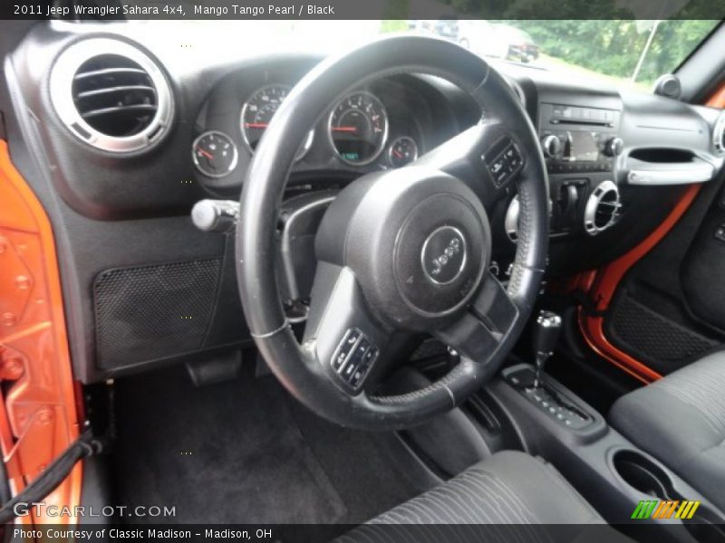 Mango Tango Pearl / Black 2011 Jeep Wrangler Sahara 4x4