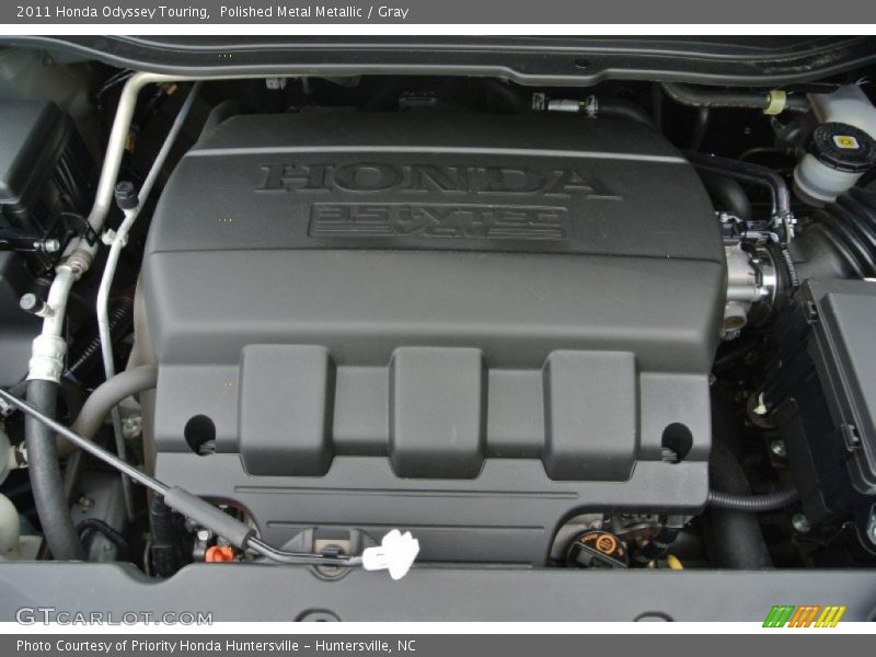 Polished Metal Metallic / Gray 2011 Honda Odyssey Touring