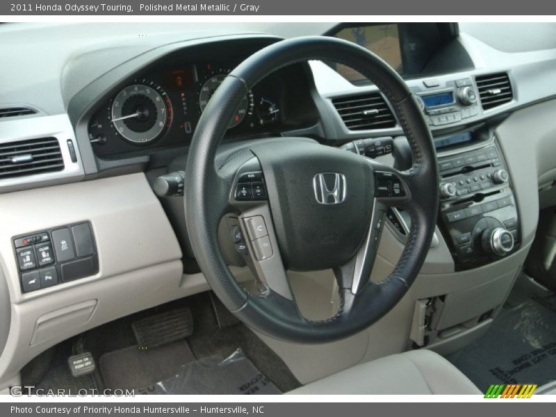Polished Metal Metallic / Gray 2011 Honda Odyssey Touring