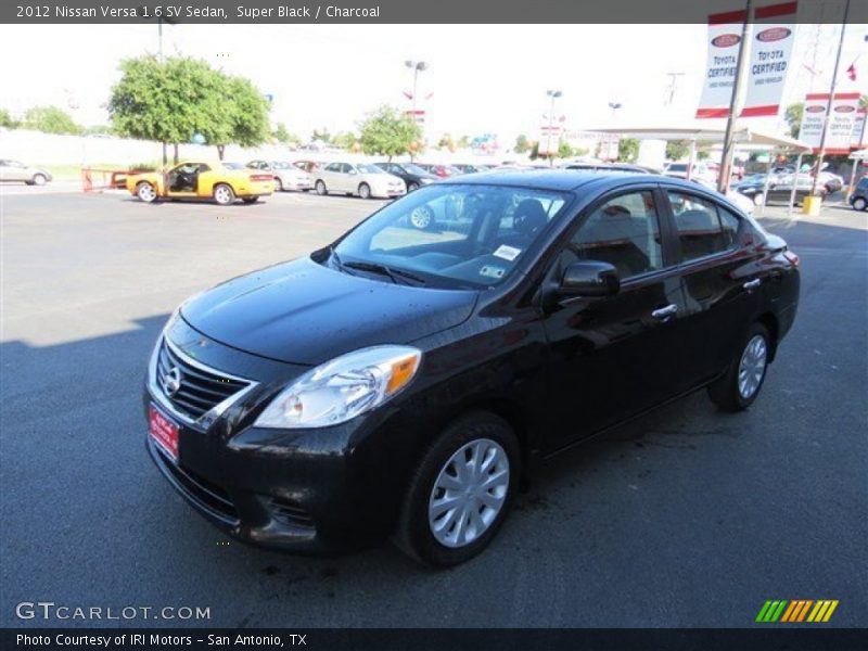Super Black / Charcoal 2012 Nissan Versa 1.6 SV Sedan