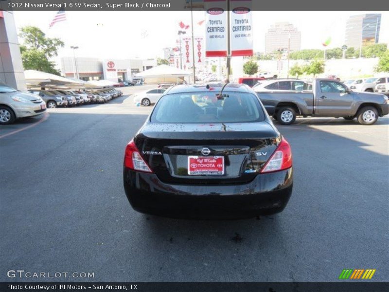 Super Black / Charcoal 2012 Nissan Versa 1.6 SV Sedan