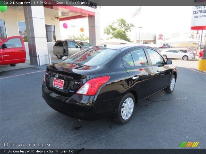 Super Black / Charcoal 2012 Nissan Versa 1.6 SV Sedan