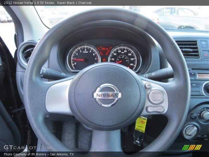 Super Black / Charcoal 2012 Nissan Versa 1.6 SV Sedan