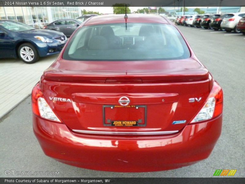 Red Brick / Charcoal 2014 Nissan Versa 1.6 SV Sedan