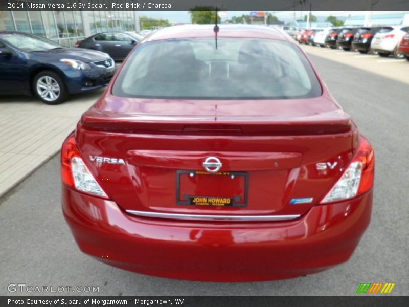 Red Brick / Charcoal 2014 Nissan Versa 1.6 SV Sedan