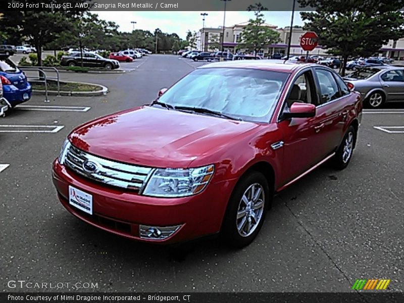 Sangria Red Metallic / Camel 2009 Ford Taurus SEL AWD