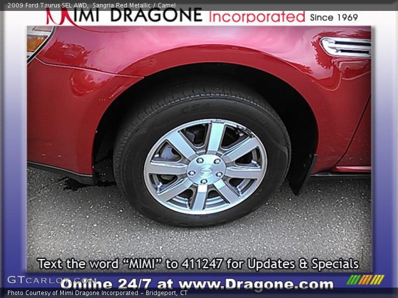 Sangria Red Metallic / Camel 2009 Ford Taurus SEL AWD