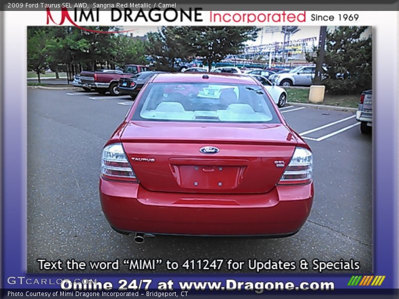 Sangria Red Metallic / Camel 2009 Ford Taurus SEL AWD