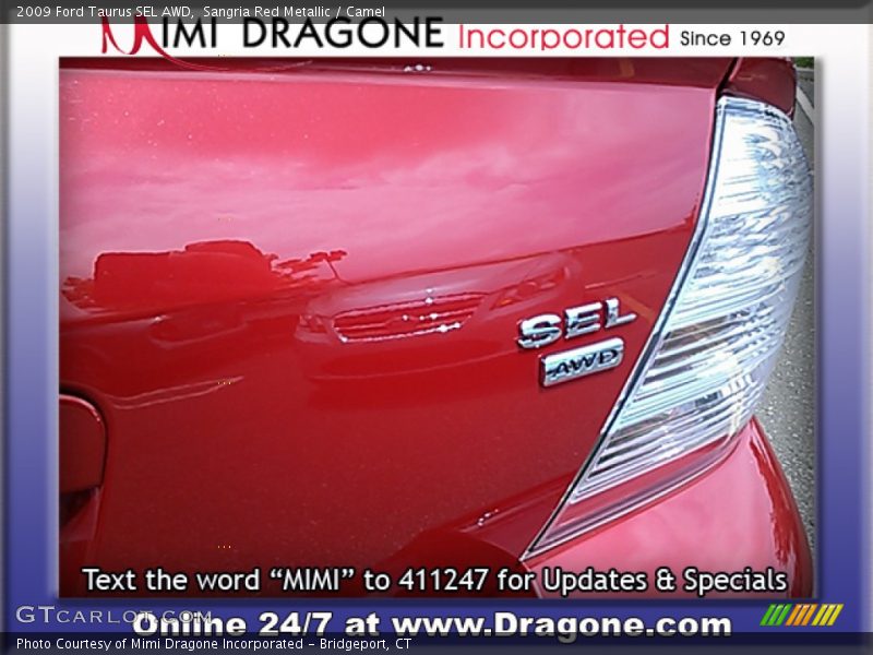 Sangria Red Metallic / Camel 2009 Ford Taurus SEL AWD
