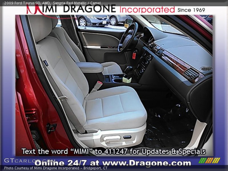 Sangria Red Metallic / Camel 2009 Ford Taurus SEL AWD