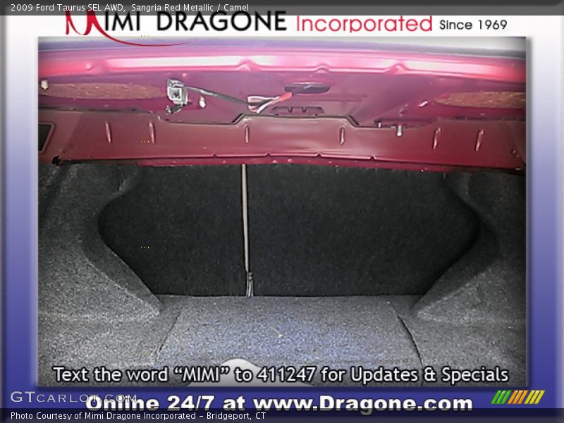 Sangria Red Metallic / Camel 2009 Ford Taurus SEL AWD