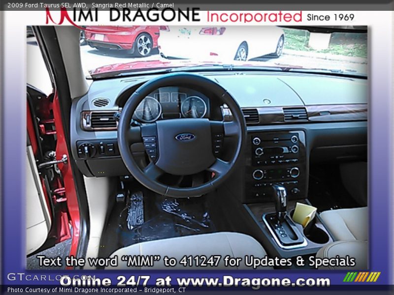Sangria Red Metallic / Camel 2009 Ford Taurus SEL AWD