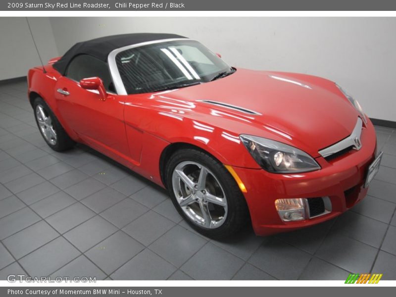 Front 3/4 View of 2009 Sky Red Line Roadster