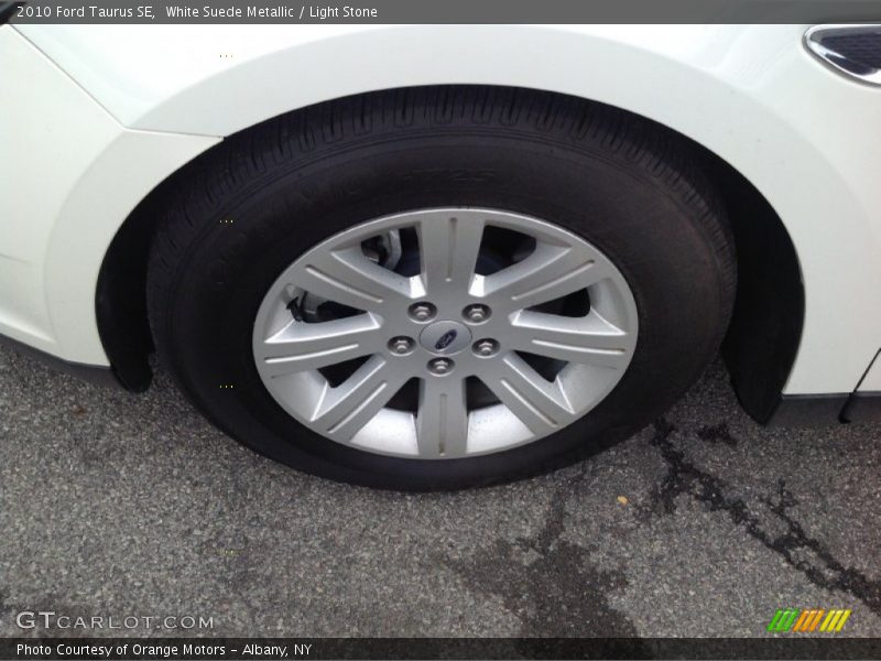 White Suede Metallic / Light Stone 2010 Ford Taurus SE