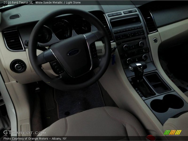 White Suede Metallic / Light Stone 2010 Ford Taurus SE