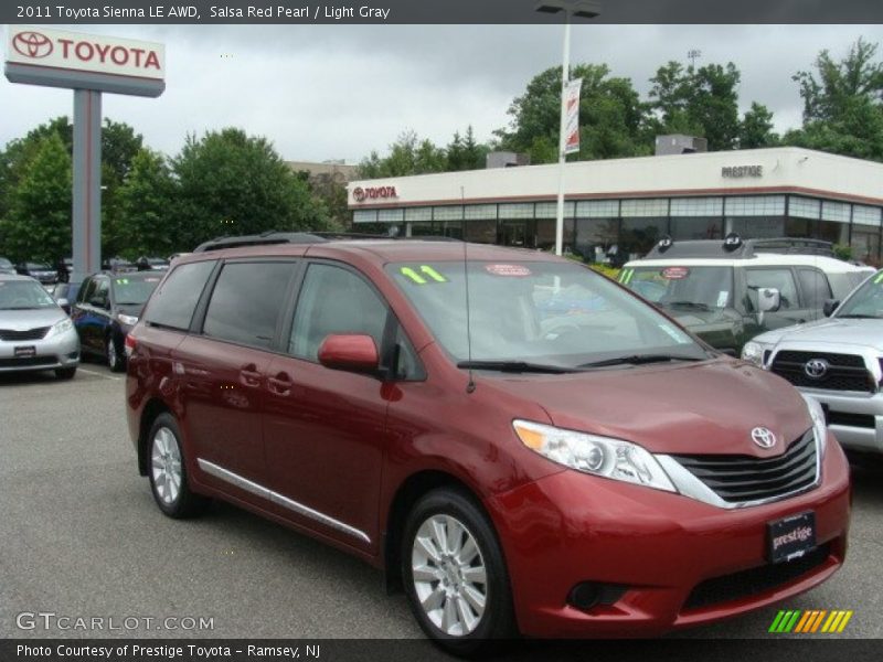 Salsa Red Pearl / Light Gray 2011 Toyota Sienna LE AWD