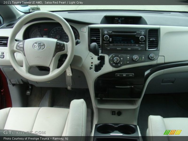 Salsa Red Pearl / Light Gray 2011 Toyota Sienna LE AWD