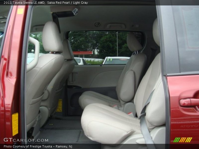 Salsa Red Pearl / Light Gray 2011 Toyota Sienna LE AWD