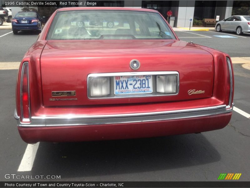 Red Tintcoat / Beige 1996 Cadillac DeVille Sedan