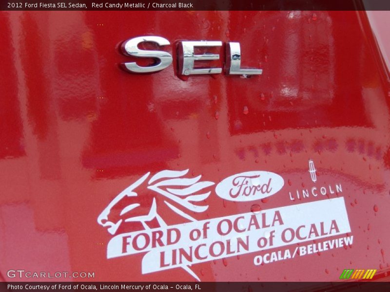 Red Candy Metallic / Charcoal Black 2012 Ford Fiesta SEL Sedan