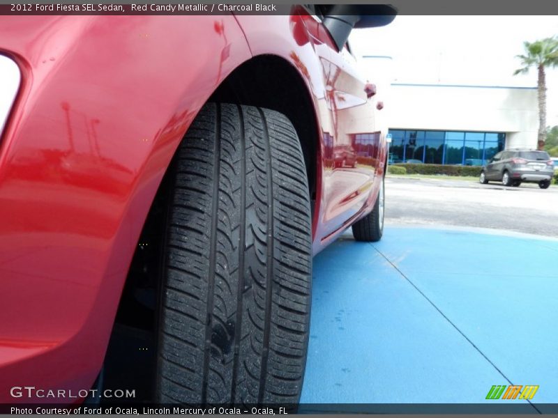 Red Candy Metallic / Charcoal Black 2012 Ford Fiesta SEL Sedan
