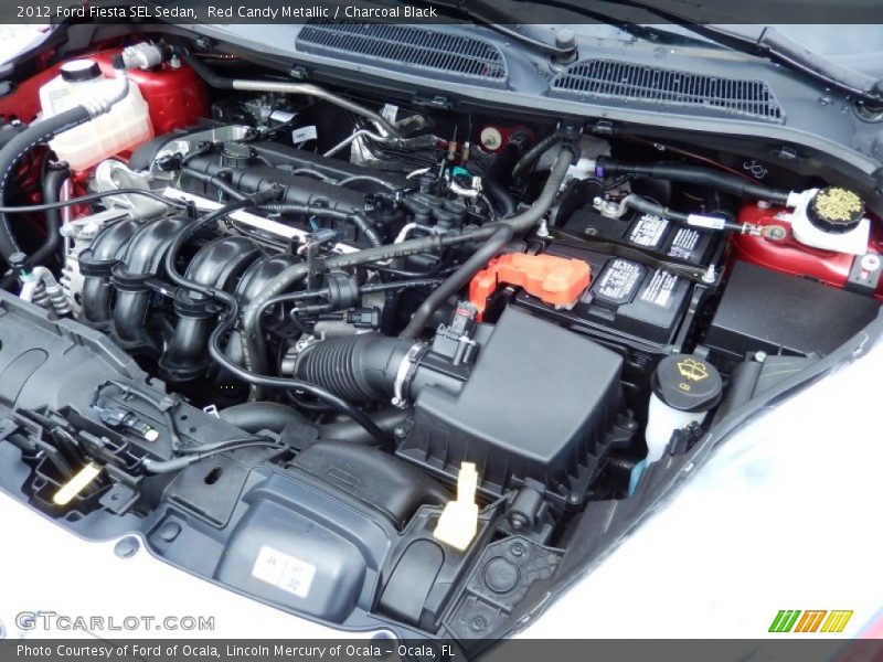 Red Candy Metallic / Charcoal Black 2012 Ford Fiesta SEL Sedan