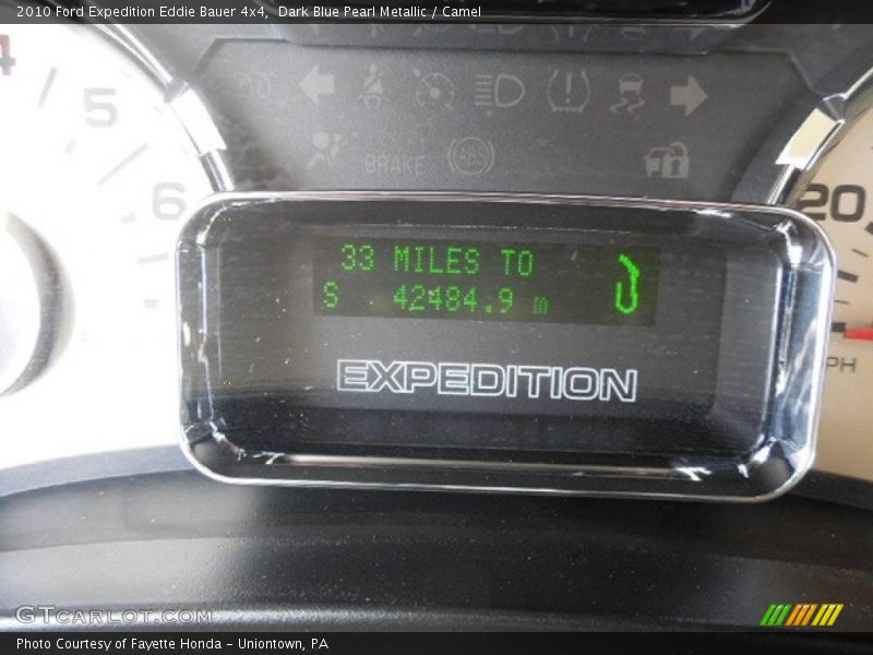 Dark Blue Pearl Metallic / Camel 2010 Ford Expedition Eddie Bauer 4x4