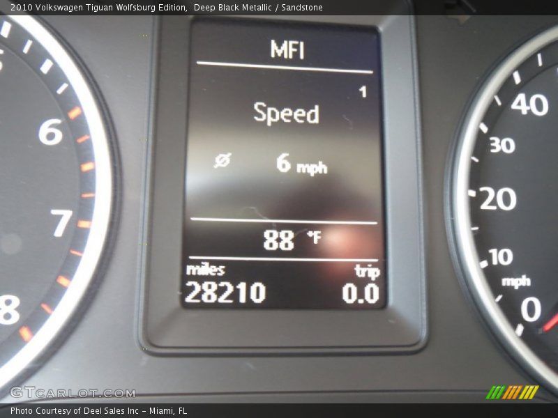 Deep Black Metallic / Sandstone 2010 Volkswagen Tiguan Wolfsburg Edition
